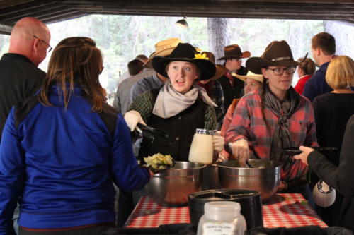 Serving Salad At The Bar T 5 Chuck Wagon Dinner-Katrina and Shanna