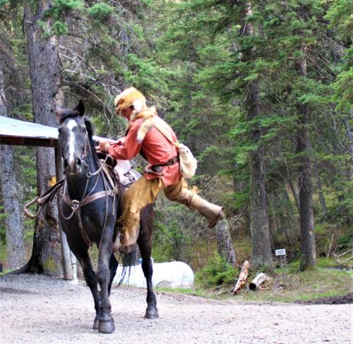 Buckskin Climbing Off His Horse