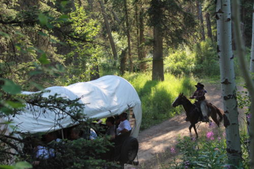 An Outlaw Behind The Wagons