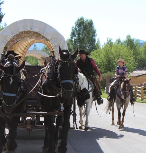 Chris & Keira Talking To The Wagons As They Head Up The Canyon